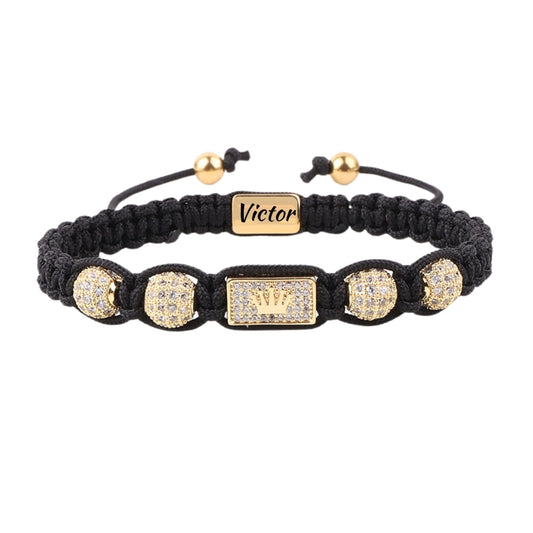 Brățară Premium Gravată din Șnur Negru cu Coroană Regală Aurie și Pietre Zirconiu, placată cu aur 14K, pentru Bărbați